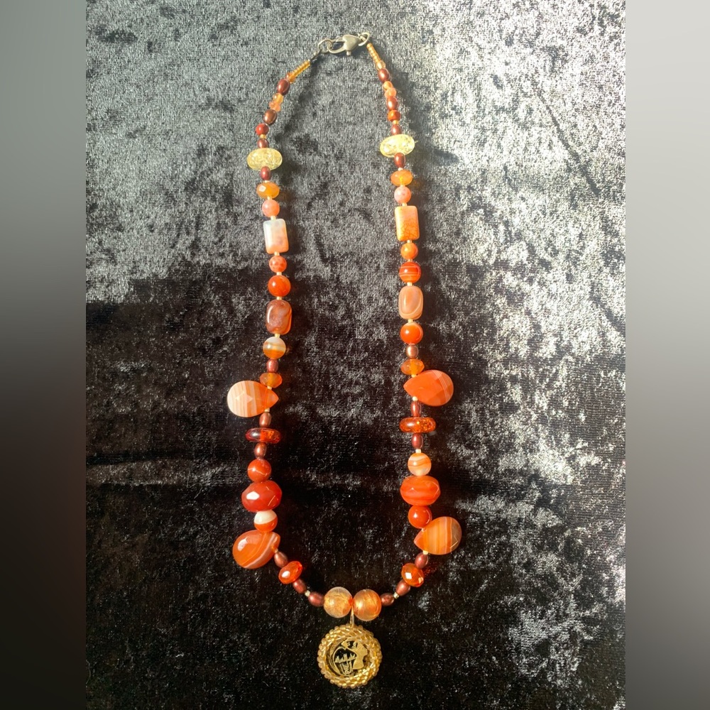 Nefertiti cut coin Murano glass necklace